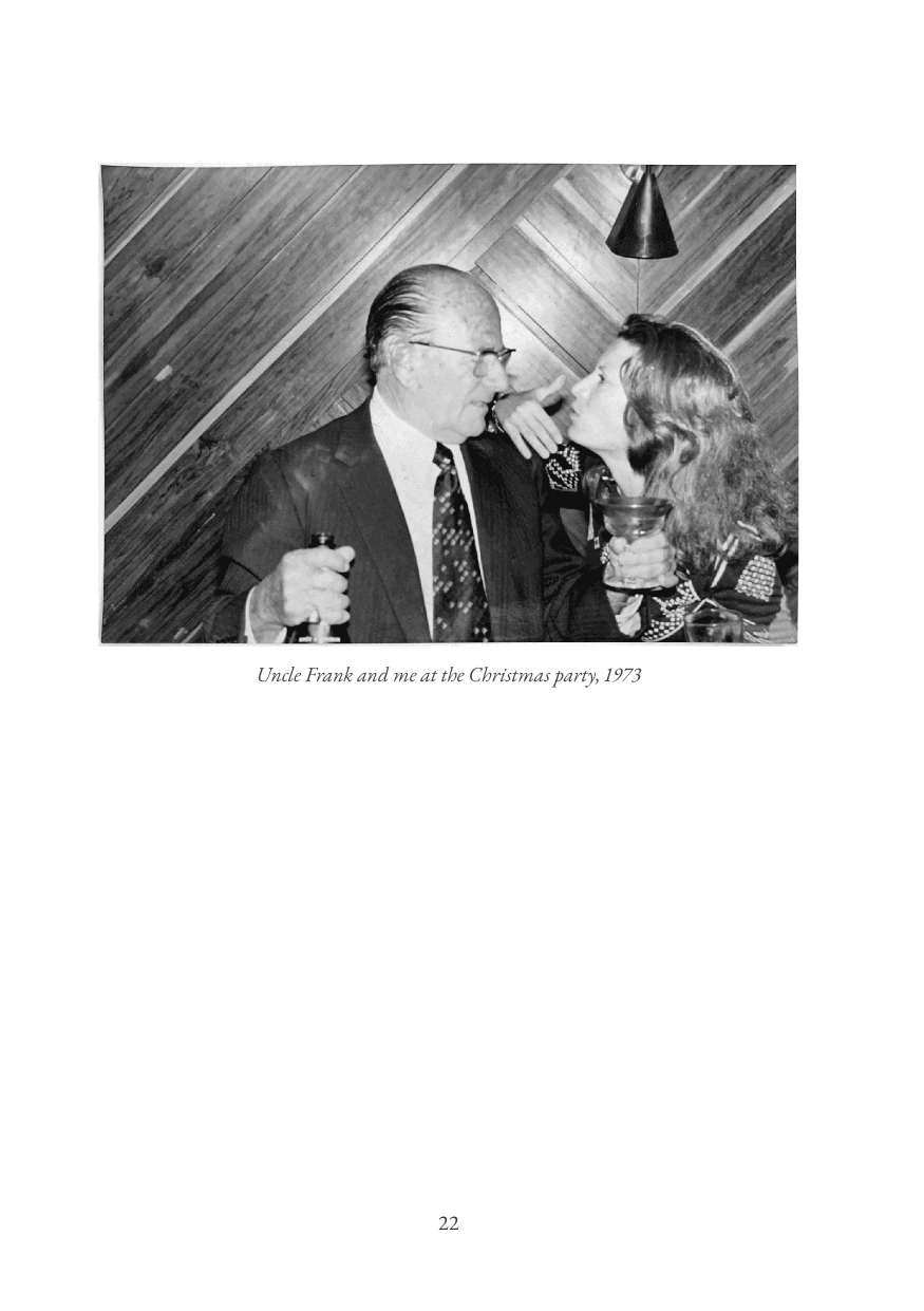 Page 22 of the sample book: a black-and-white photo with the caption “Uncle Frank and me at the Christmas party, 1973”.